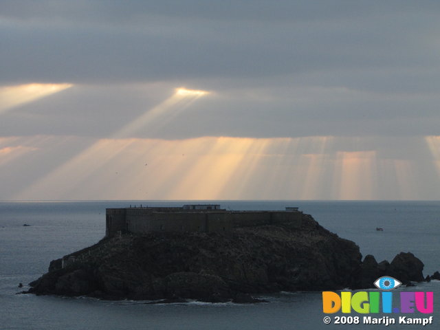 SX01238 Sunrays over fort in Milford Haven entry